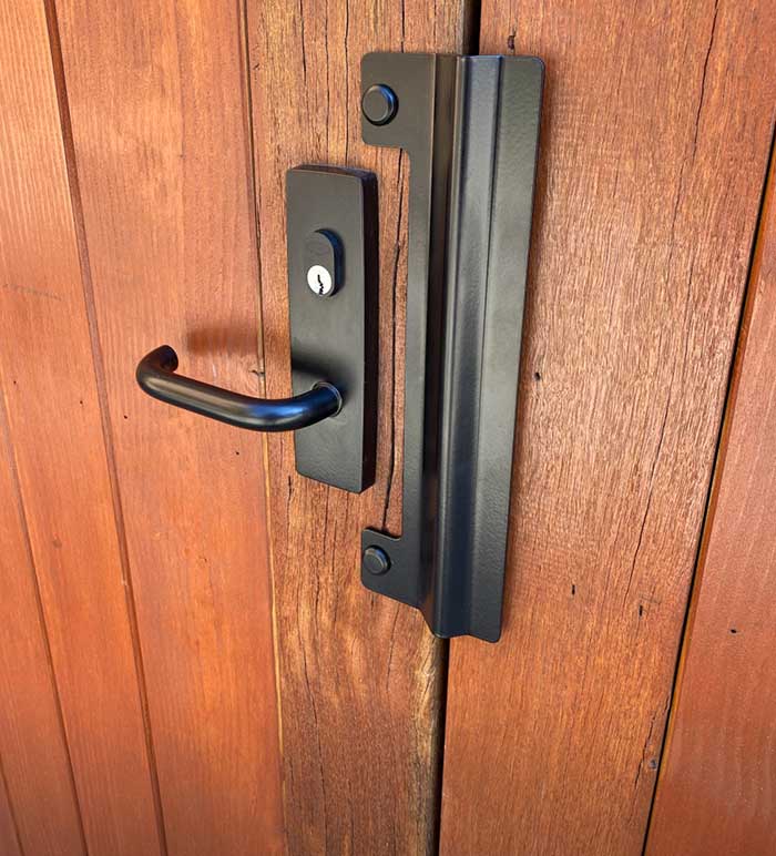Home being weatherproofed before a storm by a locksmith